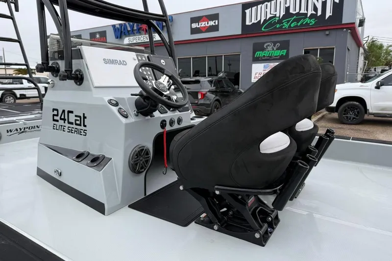 Slide: The Image of 2026 Mamba 24 Cat Elite boat on trailer, featuring sleek design and modern equipment. - 8