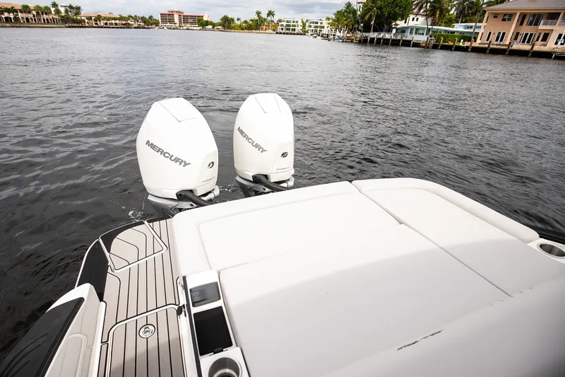 Slide: The Image of 2026 Sea Ray SLX 280 Outboard on water with Mercury engines. - 15