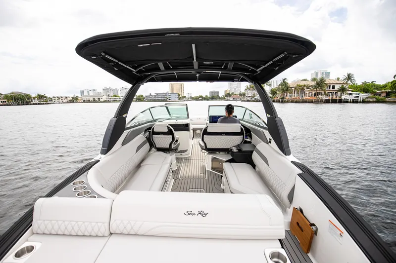 Slide: The Image of Sea Ray SLX 280 Outboard 2026 on calm waters. - 17