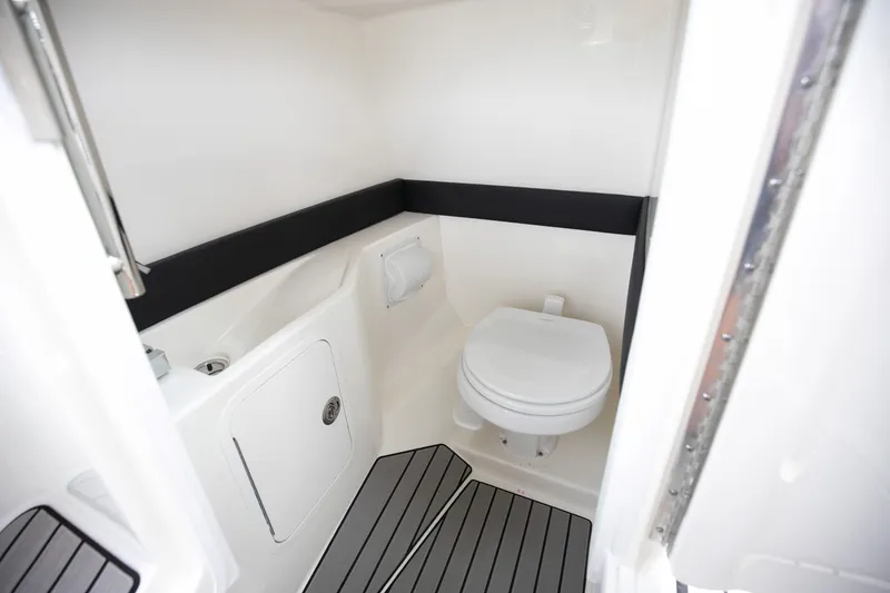 Slide: The Image of Interior of 2026 Sea Ray SLX 280 Outboard with toilet. - 45
