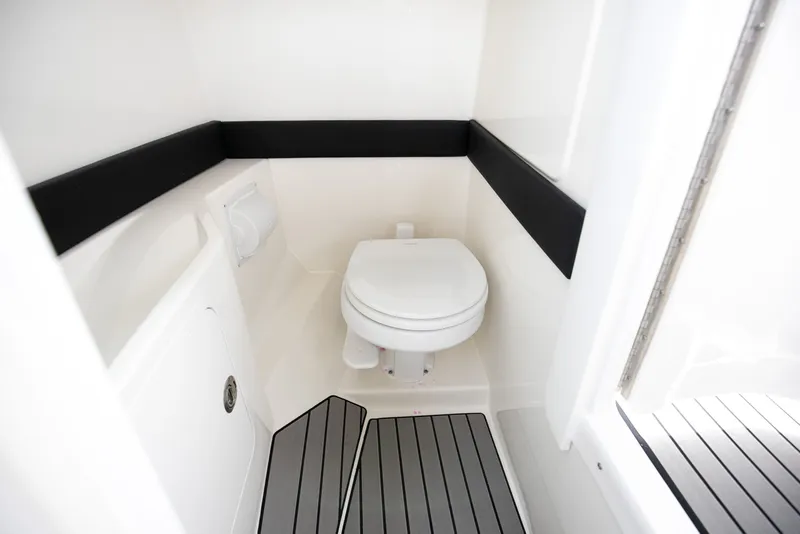 Slide: The Image of Interior of 2026 Sea Ray SLX 280 Outboard with toilet. - 46