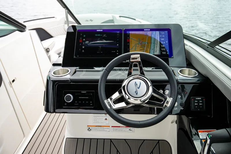Slide: The Image of 2026 Sea Ray SLX 280 Outboard cockpit with advanced navigation system. - 49