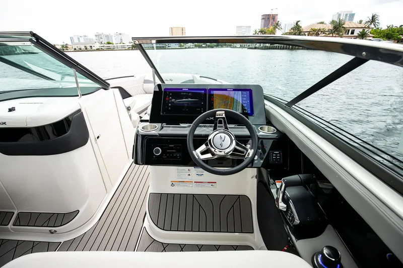 Slide: The Image of Interior view of 2026 Sea Ray SLX 280 Outboard on water. - 51