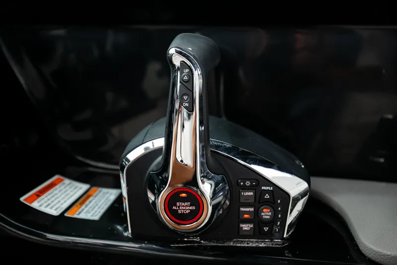 Slide: The Image of 2026 Sea Ray SLX 280 Outboard throttle lever close-up. - 54