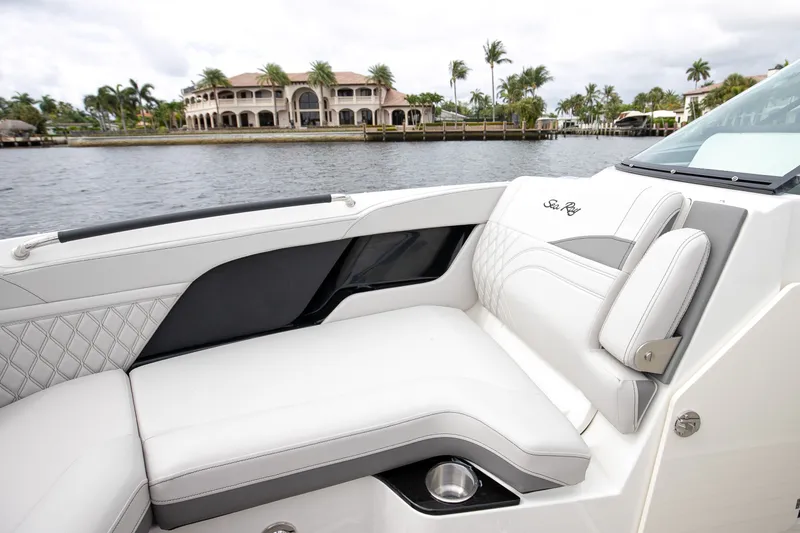 Slide: The Image of Luxurious seating area of Sea Ray SLX 280 Outboard 2026 on the water. - 59