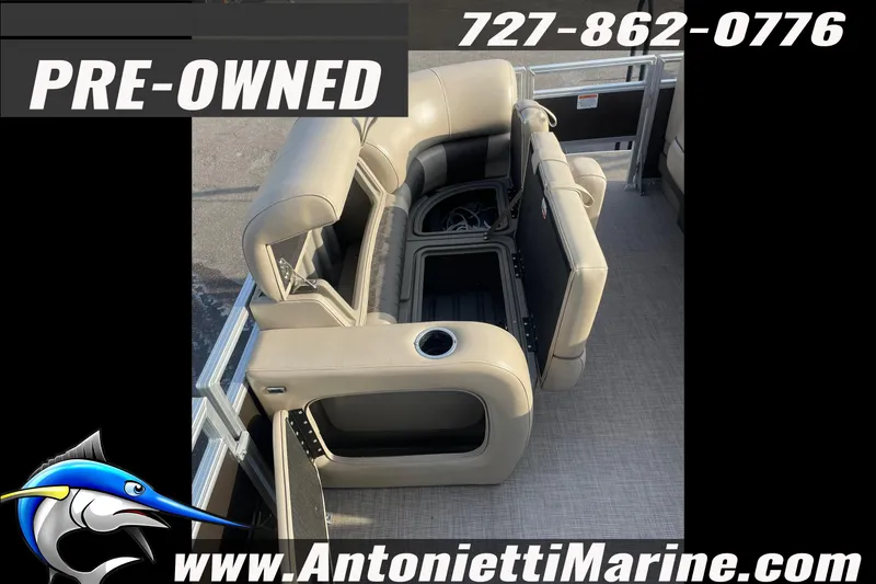 Slide: The Image of Pre-owned 2024 Sun Tracker SportFish 22 DLX pontoon boat interior seating view. - 8
