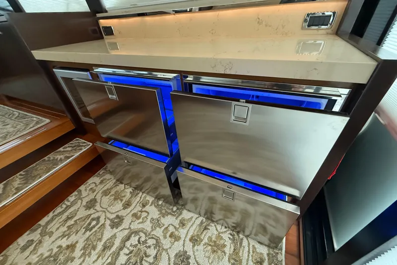 Slide: The Image of Luxurious interior of 2016 Tiara Yachts 50 Coupe with modern stainless steel appliances. - 14