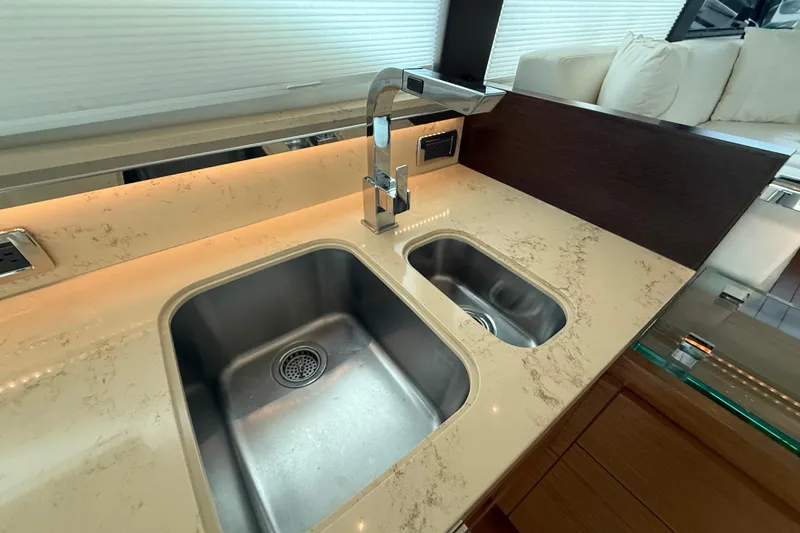 Slide: The Image of Luxurious kitchen sink area in 2016 Tiara Yachts 50 Coupe. - 18