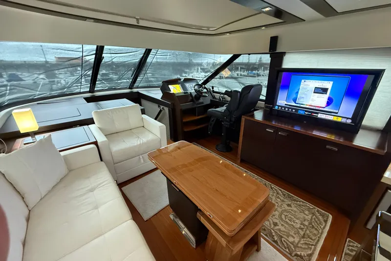 Slide: The Image of Luxurious interior of 2016 Tiara Yachts 50 Coupe with plush seating and modern amenities. - 24
