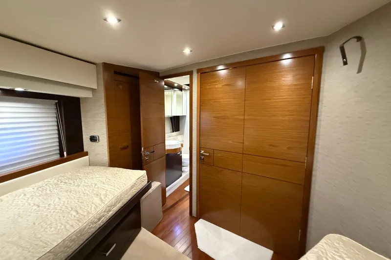Slide: The Image of Luxurious interior of 2016 Tiara Yachts 50 Coupe with wood finishes and modern lighting. - 36