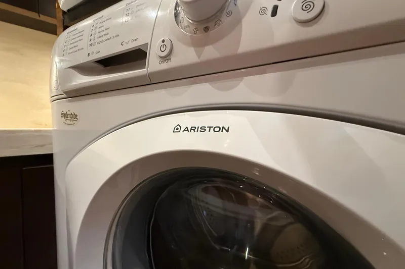 Slide: The Image of Ariston washing machine in a 2016 Tiara Yachts 50 Coupe interior. - 44