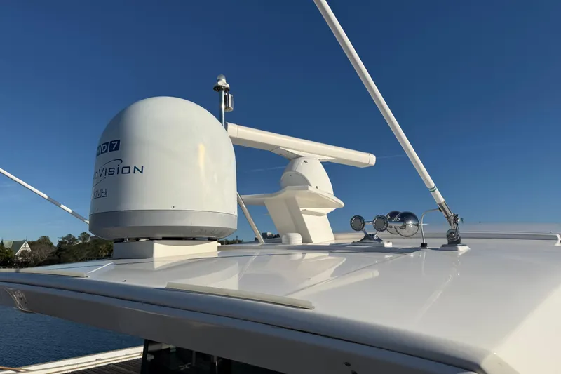 Slide: The Image of Sticker from Coastal Carolina Yacht Sales showing engine hours and date for a 2016 Tiara Yachts 50 Coupe. - 57