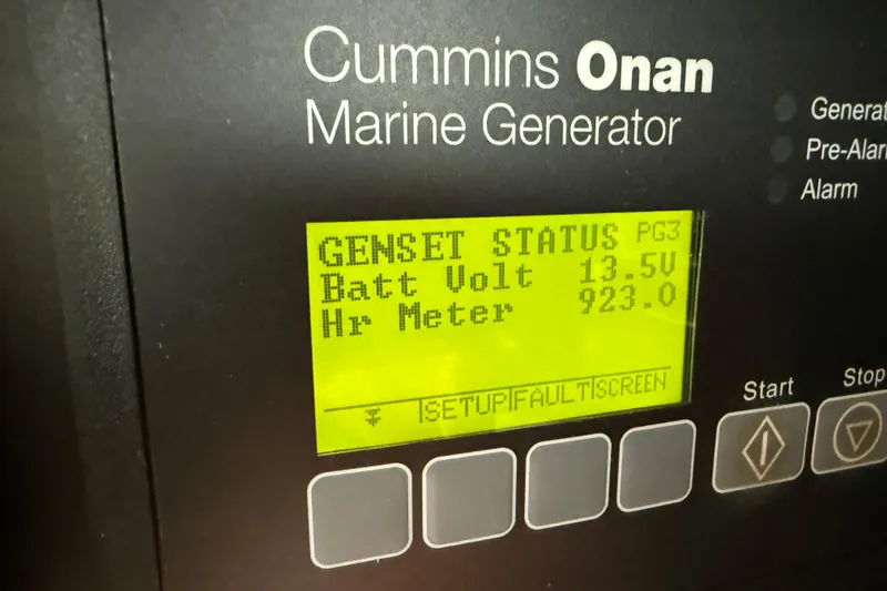 Slide: The Image of Cummins Onan marine generator display on 2016 Tiara Yachts 50 Coupe. - 61