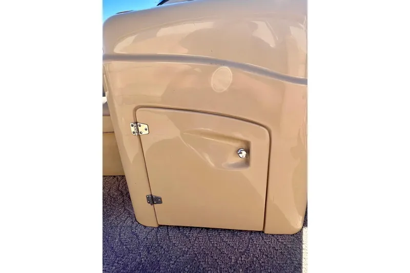 Slide: The Image of 2013 South Bay 417 CR boat dashboard with steering wheel and control panel. - 16