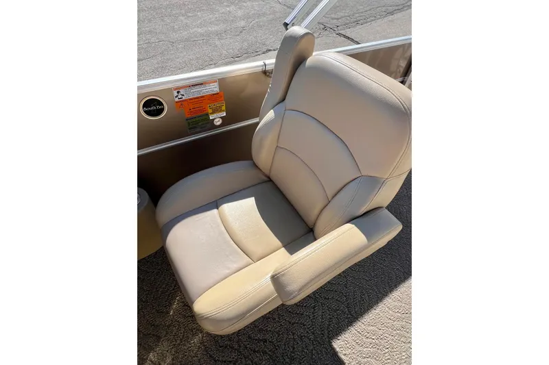 Slide: The Image of 2013 South Bay 417 CR boat with beige seating and cup holders. - 22