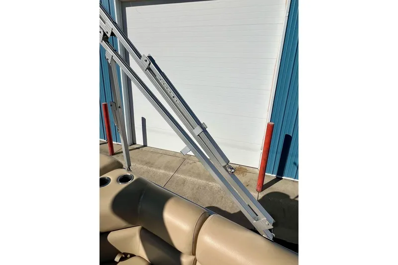 Slide: The Image of 2013 South Bay 417 CR pontoon boat front deck with metal railing. - 49