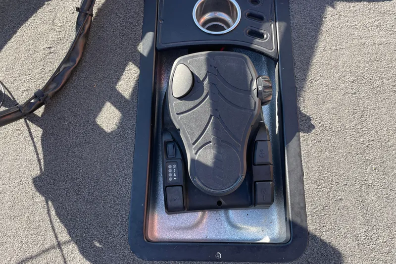 Slide: The Image of 2014 Ranger Z520C Carbon Comanche boat foot pedal and control panel. - 14