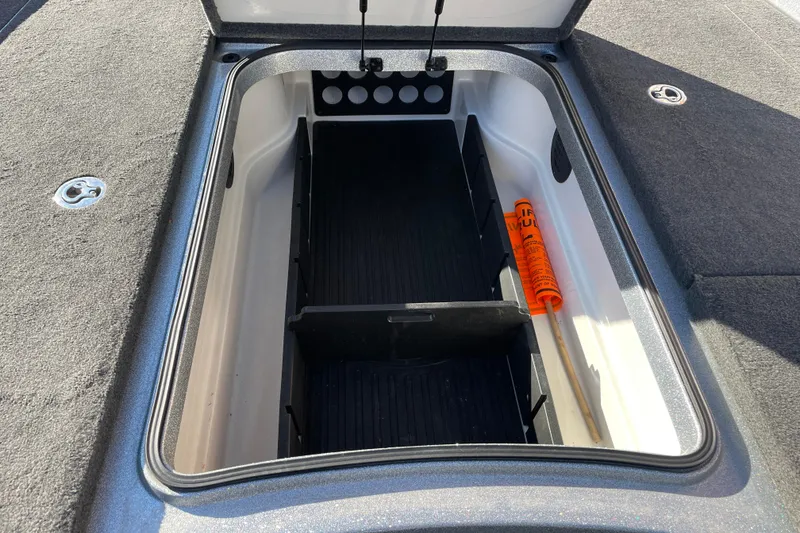 Slide: The Image of 2014 Ranger Z520C Carbon Comanche storage compartment with safety equipment. - 20