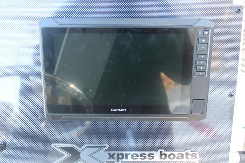Slide: The Image of Garmin display on 2026 Xpress H20B Bay boat dashboard. - 14