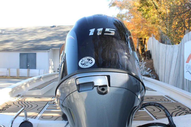 Slide: The Image of 2026 Xpress H20B Bay boat with 115 horsepower engine, ultra-low emission sticker. - 5