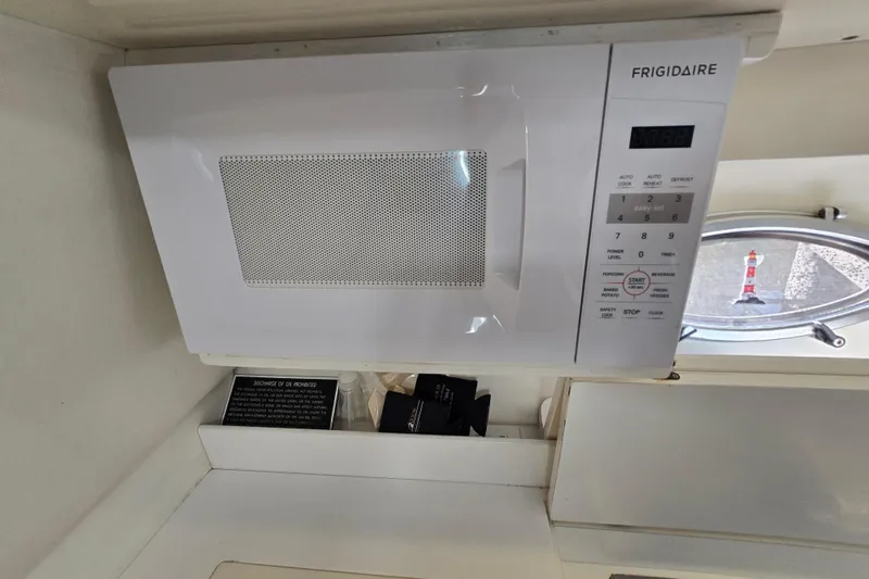 Slide: The Image of White Frigidaire microwave in Giorgi 46 yacht kitchen, 1993 model. - 107