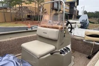 Slide: The Image of 2007 Alumacraft 1756 All Weld MV CC boat with central console and seating. - 3