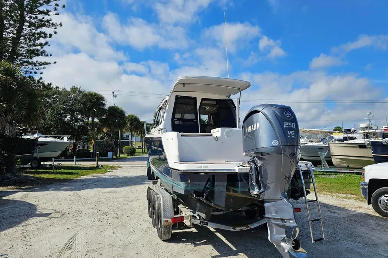 Slide: The Image of 2024 Cutwater C-248 Coupe boat with Yamaha 250 V6 engine on trailer. - 5
