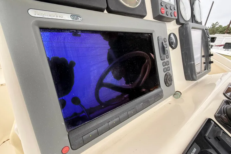 Slide: The Image of Control panel of a 1997 Pursuit 2800 Offshore boat with Raymarine C120 display. - 21