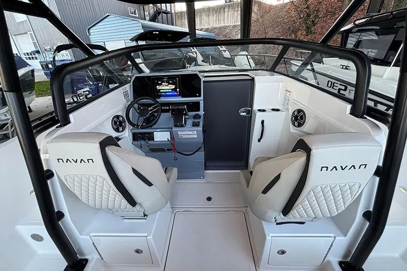 Slide: The Image of 2026 Navan S30 boat interior with modern dashboard and comfortable seating. - 11