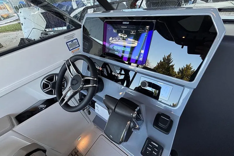 Slide: The Image of 2026 Navan S30 boat dashboard with touchscreen display and modern steering wheel. - 12