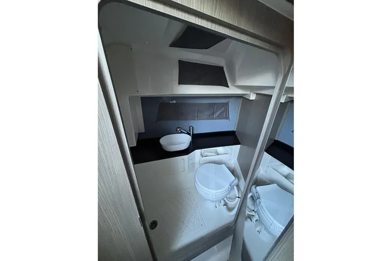 Slide: The Image of Modern bathroom interior of 2026 Navan S30 boat, featuring sleek design and compact fixtures. - 19