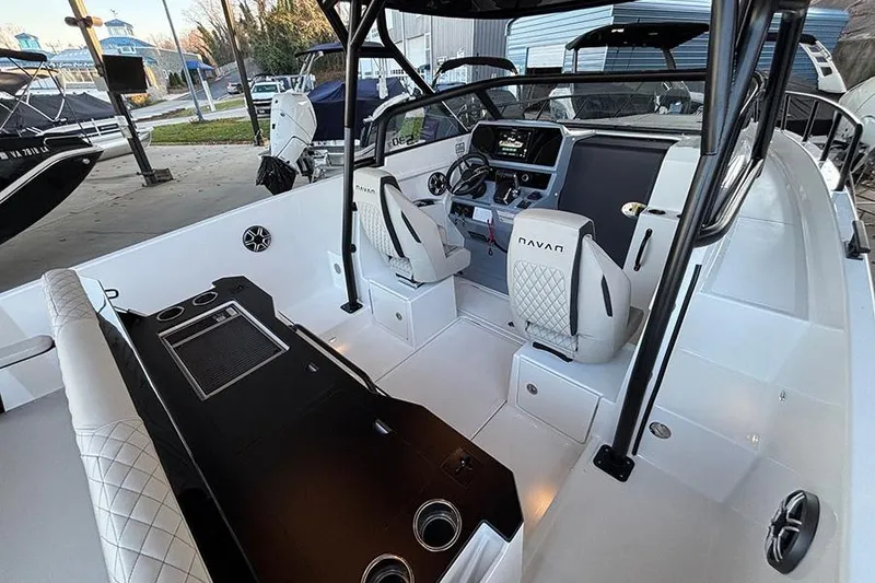 Slide: The Image of 2026 Navan S30 boat interior with modern dashboard and seating. - 8