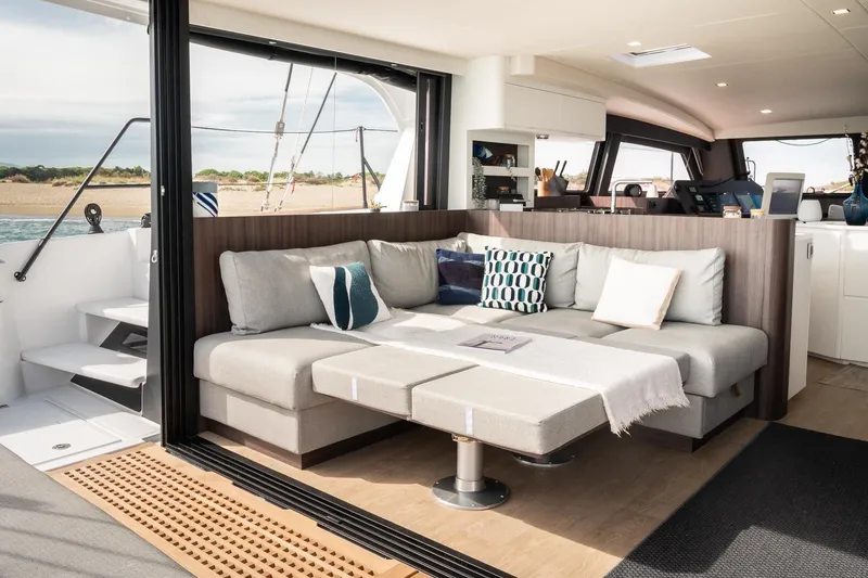 Slide: The Image of Luxurious interior of 2026 Catana OC2 catamaran with modern seating and ocean view. - 10