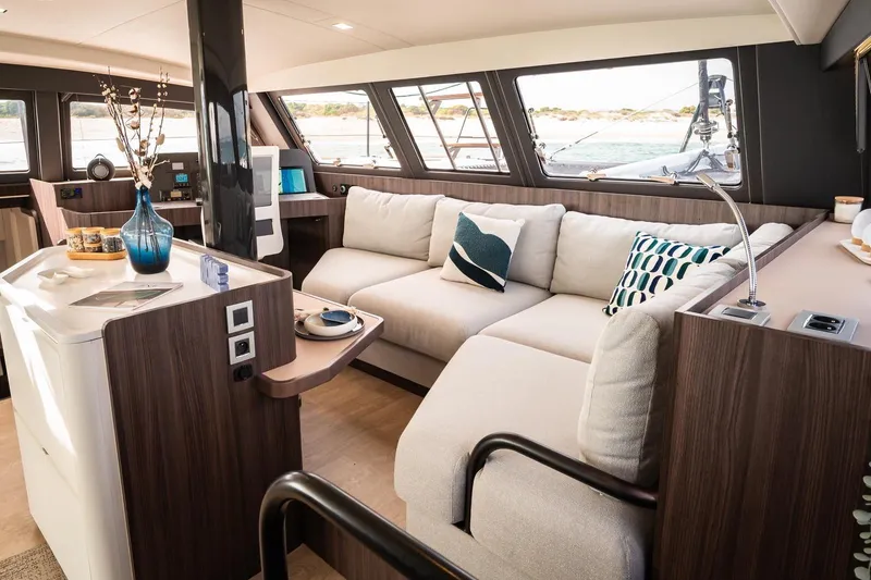 Slide: The Image of Luxurious interior of 2026 Catana OC2 yacht with modern furnishings and panoramic windows. - 15