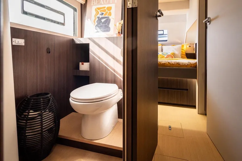 Slide: The Image of Modern bathroom and bedroom interior in 2026 Catana OC2 yacht, featuring sleek design and natural lighting. - 27