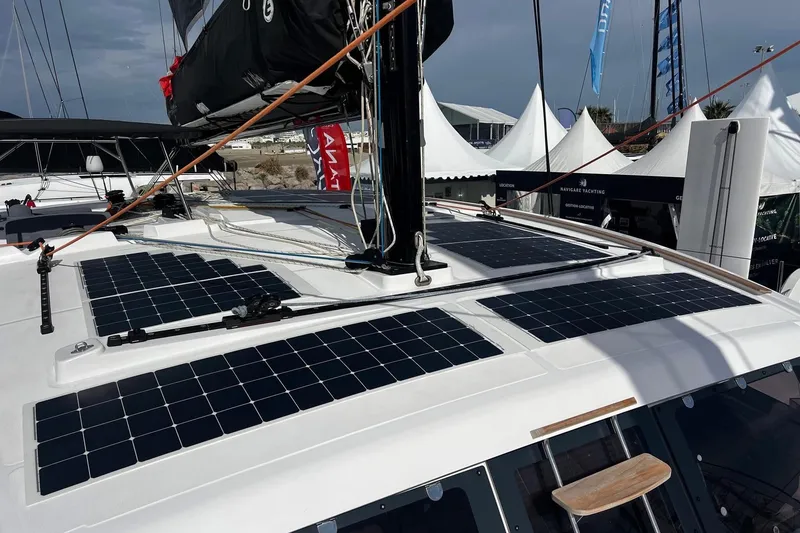 Slide: The Image of 2026 Catana OC2 yacht with solar panels on deck at a marina. - 4