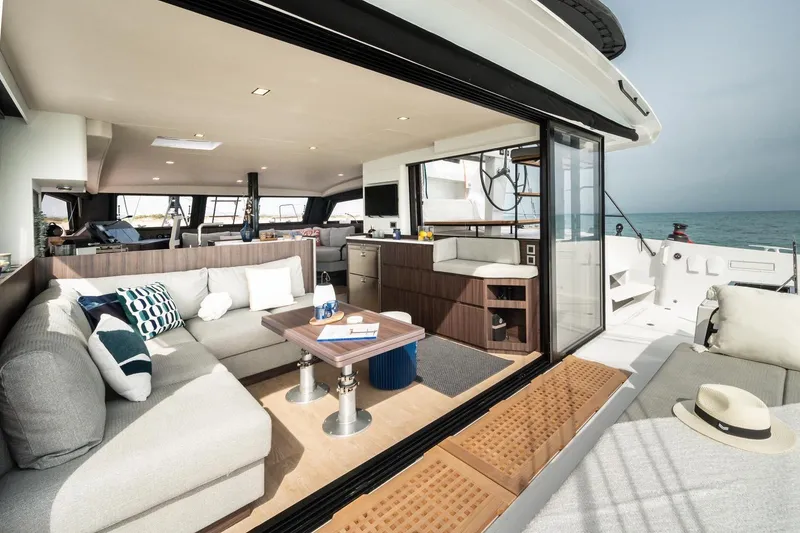 Slide: The Image of Luxurious interior of 2026 Catana OC2 yacht with modern seating and ocean view. - 6
