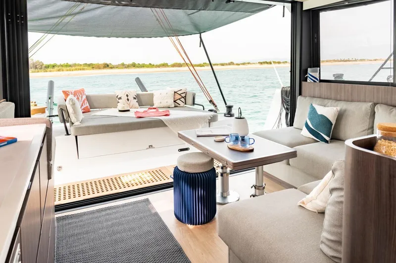 Slide: The Image of Luxurious interior of 2026 Catana OC2 catamaran with modern seating and ocean view. - 7