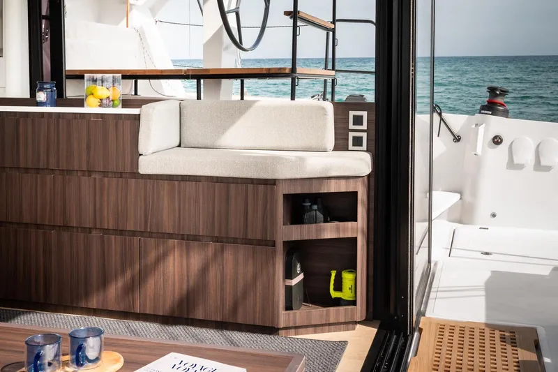 Slide: The Image of Luxurious interior of 2026 Catana OC2 yacht with ocean view and modern furnishings. - 8