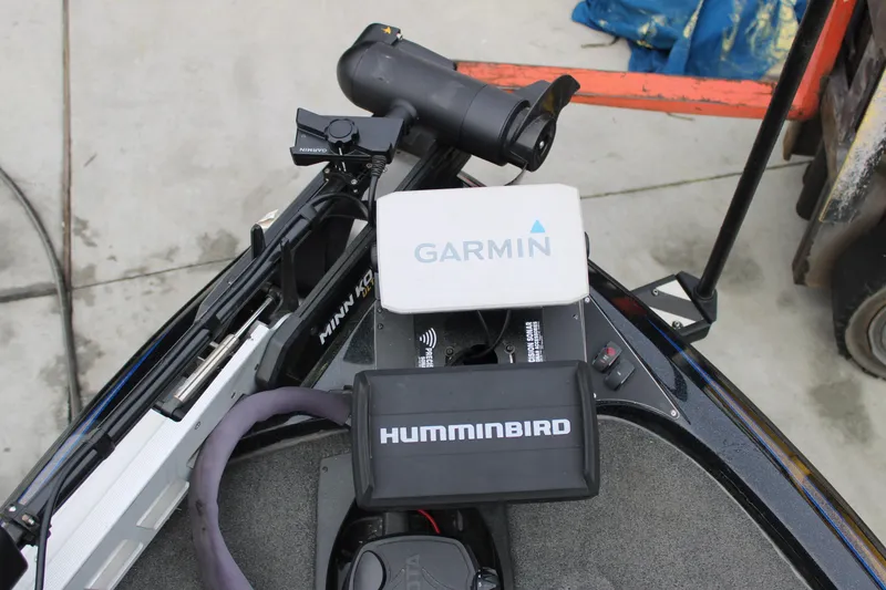 Slide: The Image of 2022 Skeeter ZX225 boat with Garmin and Humminbird electronics on deck. - 15