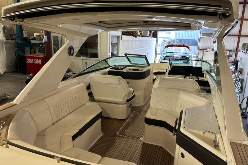Slide: The Image of Luxurious interior of 2023 Sea Ray SLX 310 boat with elegant seating and modern design. - 10