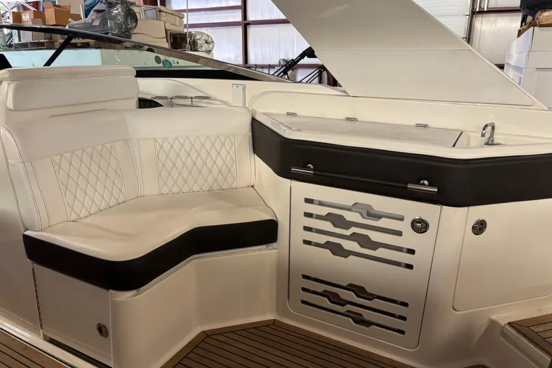 Slide: The Image of Luxurious interior of 2023 Sea Ray SLX 310 boat with elegant seating and sleek design. - 7
