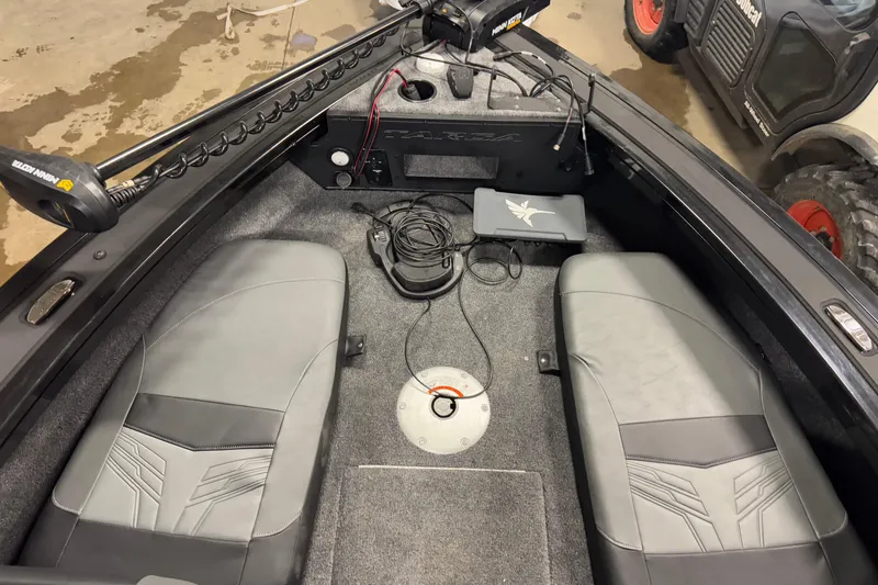 Slide: The Image of 2026 Tracker Targa V-18 Combo boat interior with seating and equipment. - 21