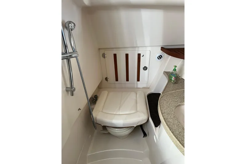 Slide: The Image of 2015 Grady-White Freedom 375 boat bathroom with shower and sink. - 16