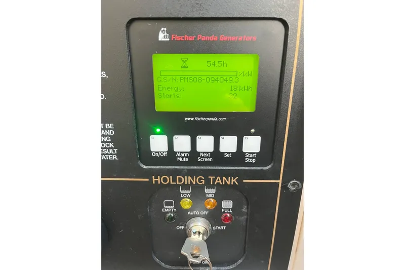 Slide: The Image of Fischer Panda generator control panel on 2015 Grady-White Freedom 375 boat. - 18