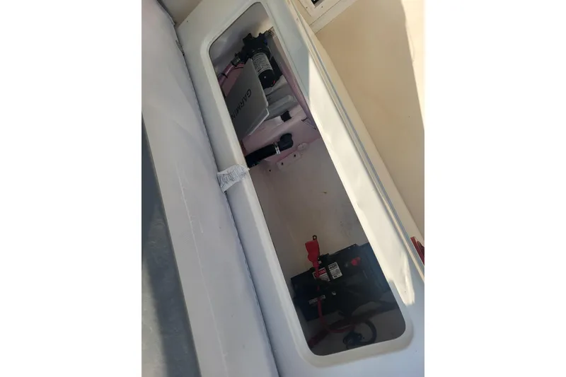 Slide: The Image of Interior view of 2021 Steiger Craft 255 DV MIAMI boat compartment with equipment. - 10