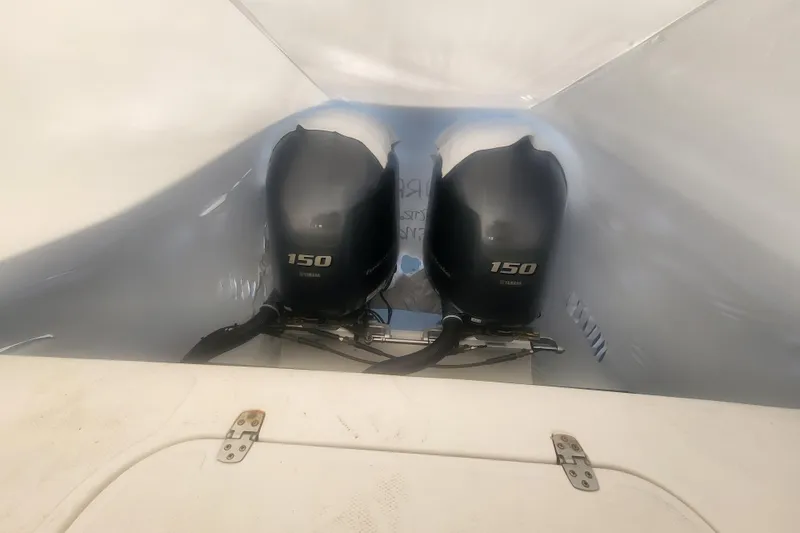 Slide: The Image of 2021 Steiger Craft 255 DV MIAMI boat interior with steering wheel and captain's chair. - 6