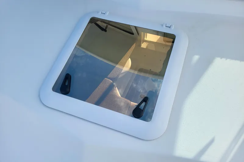 Slide: The Image of 2021 Steiger Craft 255 DV MIAMI boat hatch with interior view. - 61