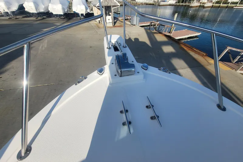 Slide: The Image of 2021 Steiger Craft 255 DV MIAMI boat bow with stainless steel railings at dock. - 62