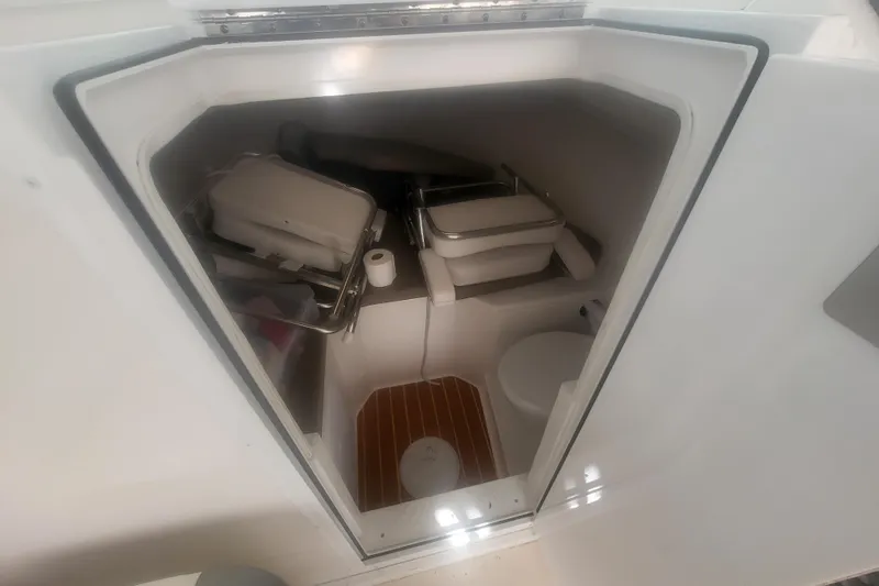 Slide: The Image of 2021 Steiger Craft 255 DV MIAMI boat interior with seating and navigation equipment. - 7